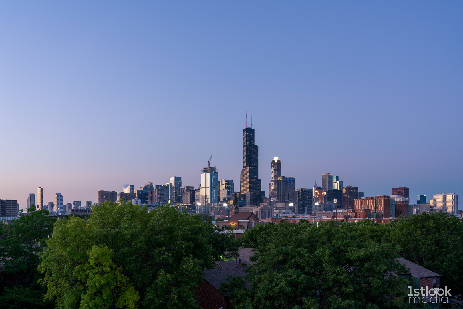 1033 West 14th Place, Unit 413 Chicago, IL 60608 - Photo 25 of 42 a view of a city with tall buildings in the background