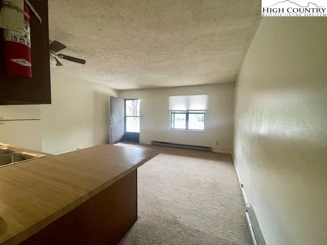 a view of livingroom and hardwood