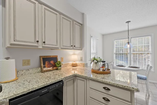 a bed room with a bed and a ceiling fan