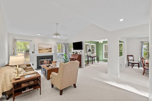 a bathroom with a double vanity sink mirror and shower