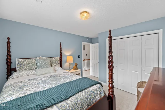 a view of a swimming pool and an outdoor seating