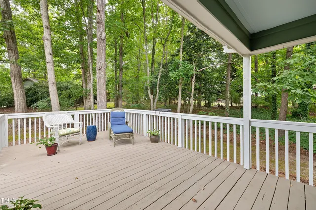 a view of a swimming pool with a yard