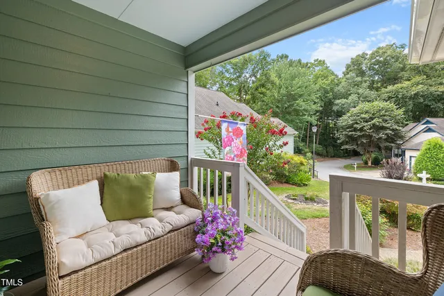 a view of a livingroom with furniture and a potted plant