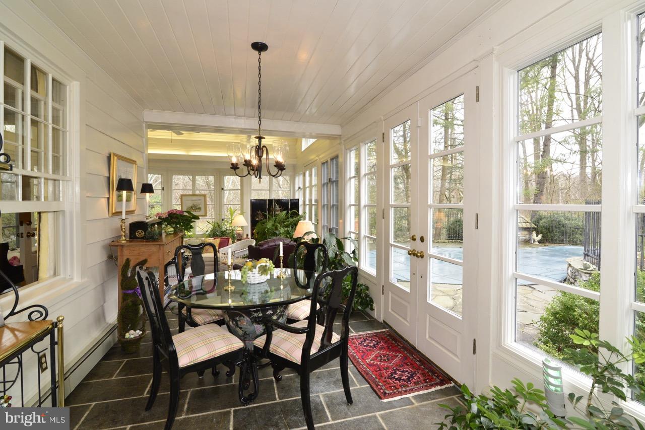3072 Swift Shoals Road Boyce, VA 22620 - Photo 14 of 30 a view of a dining room with furniture a chandelier and wooden floor