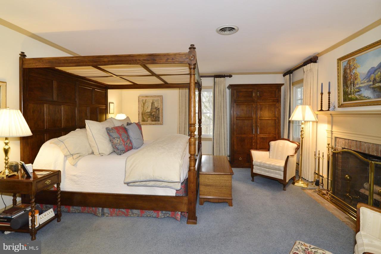 3072 Swift Shoals Road Boyce, VA 22620 - Photo 20 of 30 a bedroom with a bed and a couch