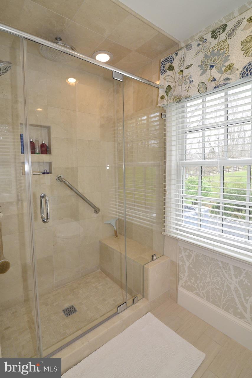 3072 Swift Shoals Road Boyce, VA 22620 - Photo 21 of 30 a bathroom with a shower and a bathtub