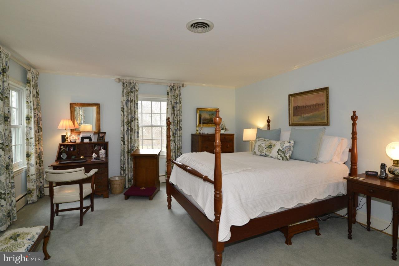 3072 Swift Shoals Road Boyce, VA 22620 - Photo 23 of 30 a bed room with a bed and chair