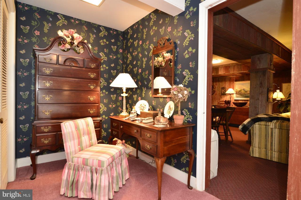 3072 Swift Shoals Road Boyce, VA 22620 - Photo 27 of 30 a living room with furniture and wooden floor