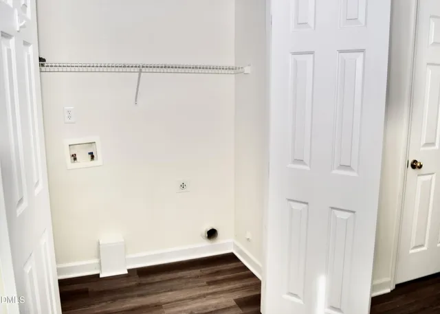 a view of small space with wooden floor