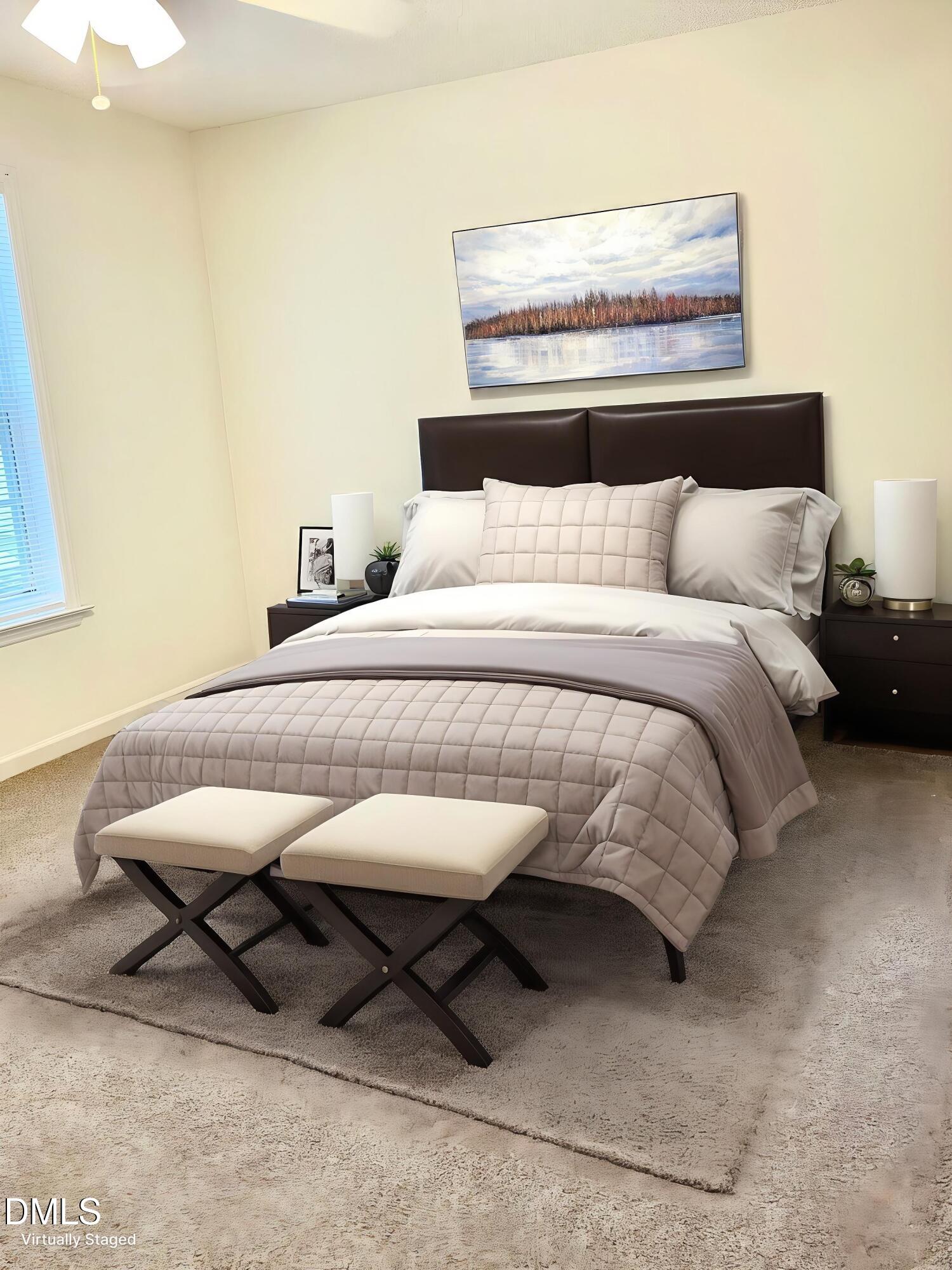 5100 Mass Rock Drive Raleigh, NC 27610 - Photo 14 of 30 a bedroom with a bed a table and chair