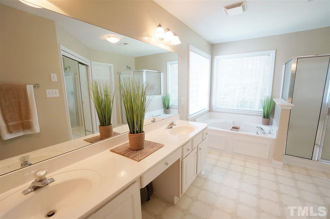 8400 Neuse Rapids Road Raleigh, NC 27616 - Photo 10 of 20 Spacious layout, dual vanities, garden tub & separate shower.
