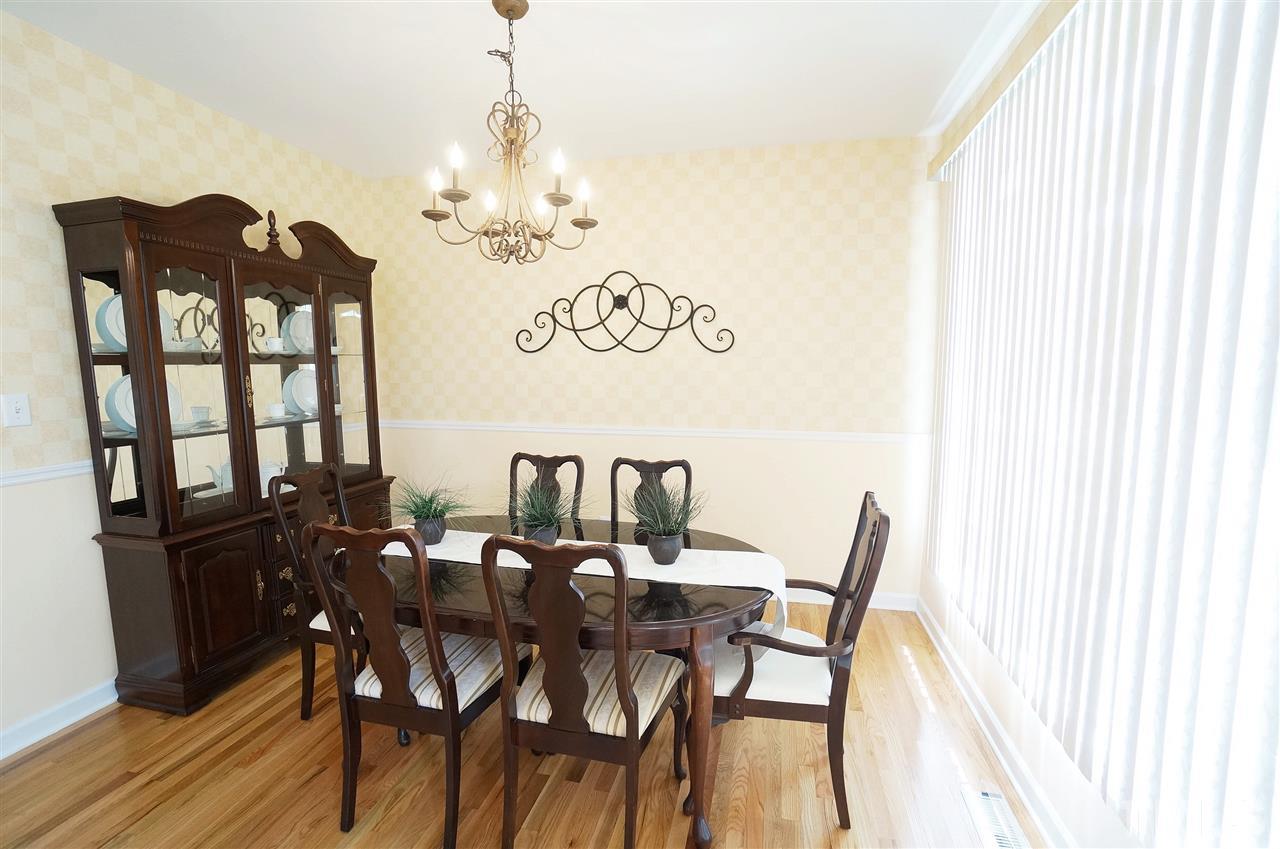 8400 Neuse Rapids Road Raleigh, NC 27616 - Photo 3 of 20 Hardwood floors. Beautiful natural lighting.