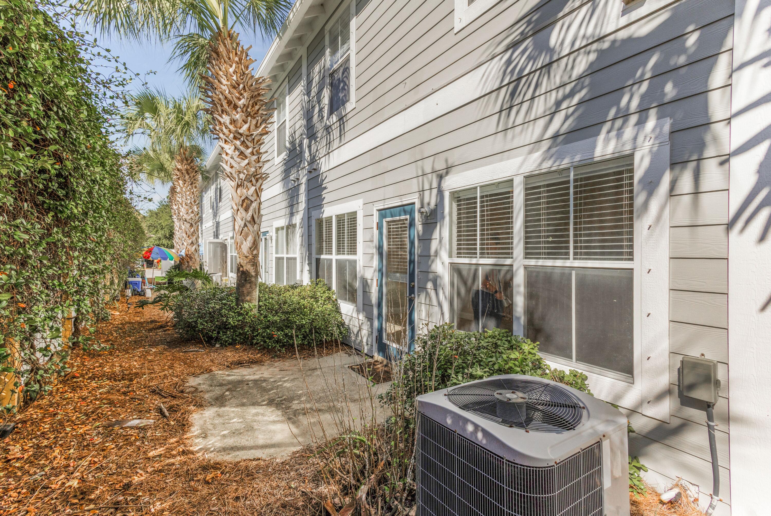 24 Talon Court, Unit C Santa Rosa Beach, FL 32459 - Photo 15 of 29 a front view of house and yard
