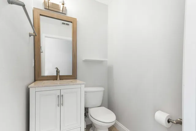 a view of bathroom with washer and dryer