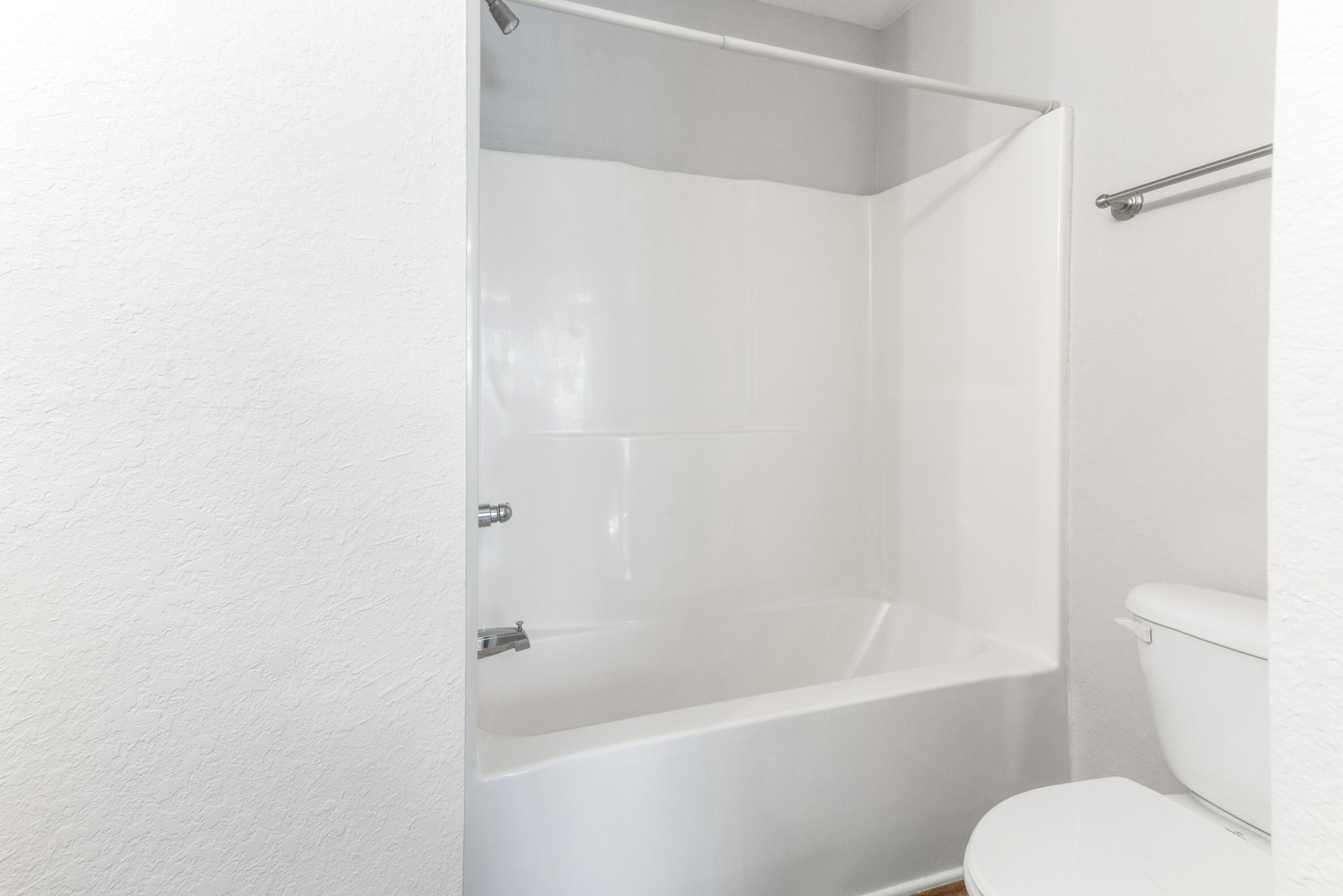 24 Talon Court, Unit C Santa Rosa Beach, FL 32459 - Photo 25 of 29 a white toilet sitting next to a bath tub