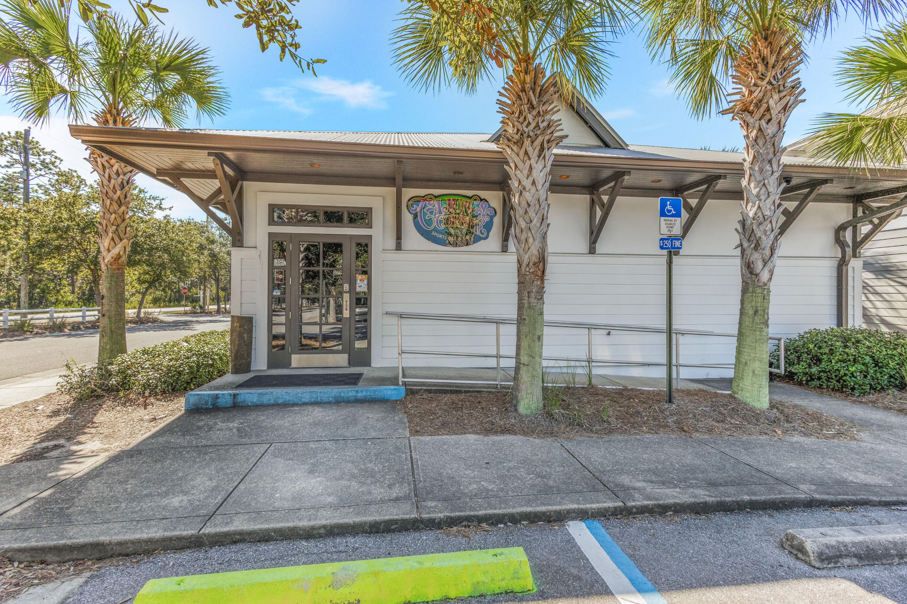 24 Talon Court, Unit C Santa Rosa Beach, FL 32459 - Photo 27 of 29 a view of a house with a yard