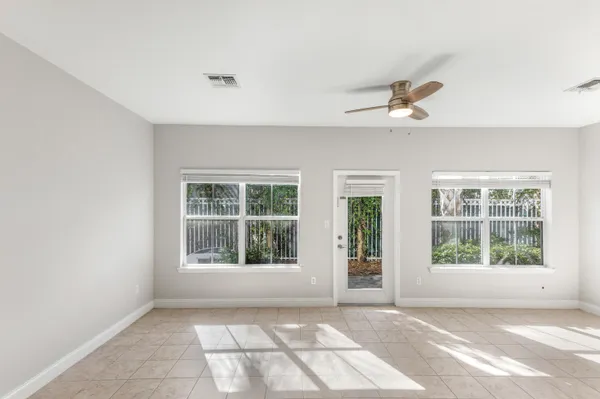 a view of an empty room with a window