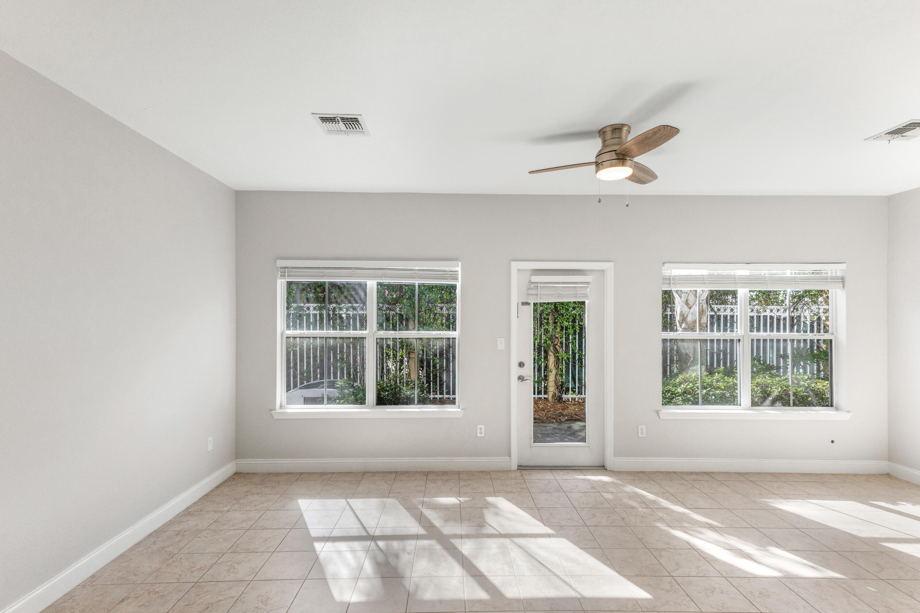 24 Talon Court, Unit C Santa Rosa Beach, FL 32459 - Photo 9 of 29 a view of an empty room with a window