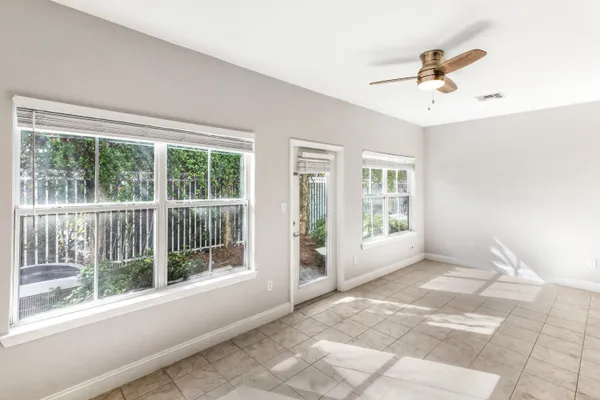 a view of a dining room with furniture window and outside view