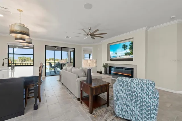 $549,000 | 10812 Tarflower Drive, Unit 201, Venice, FL 34293