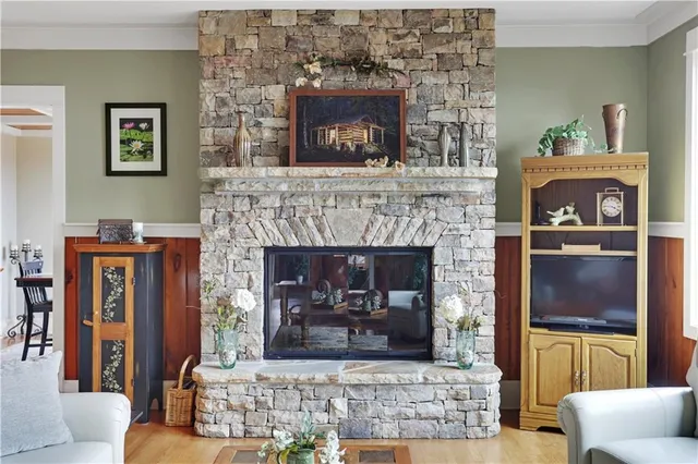 a bed room with a bed and a television