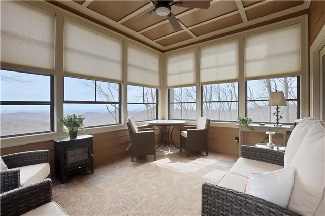 a spacious bathroom with a shower sink and mirror