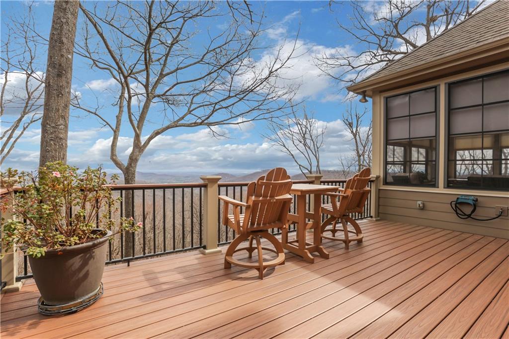 79 Strawberry Way Jasper, GA 30143 - Photo 21 of 67 a view of a patio with table and chairs and wooden floor