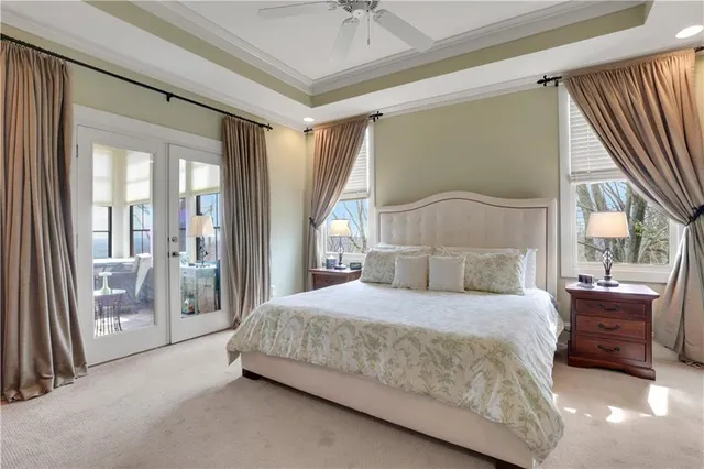 a bathroom with a sink vanity mirror and toilet