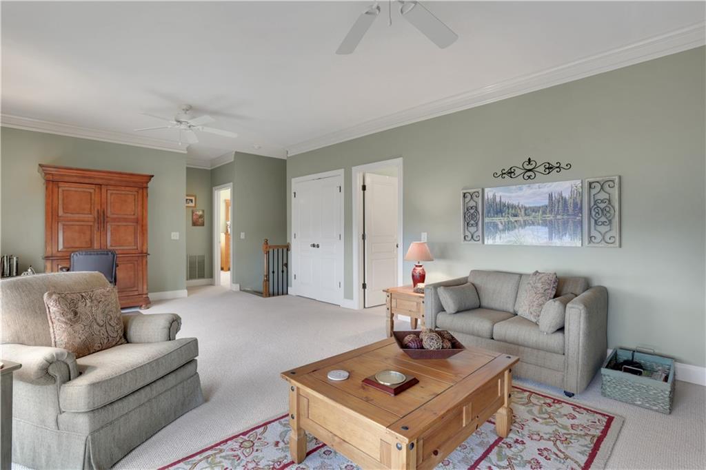 79 Strawberry Way Jasper, GA 30143 - Photo 35 of 67 a living room with furniture and a couch
