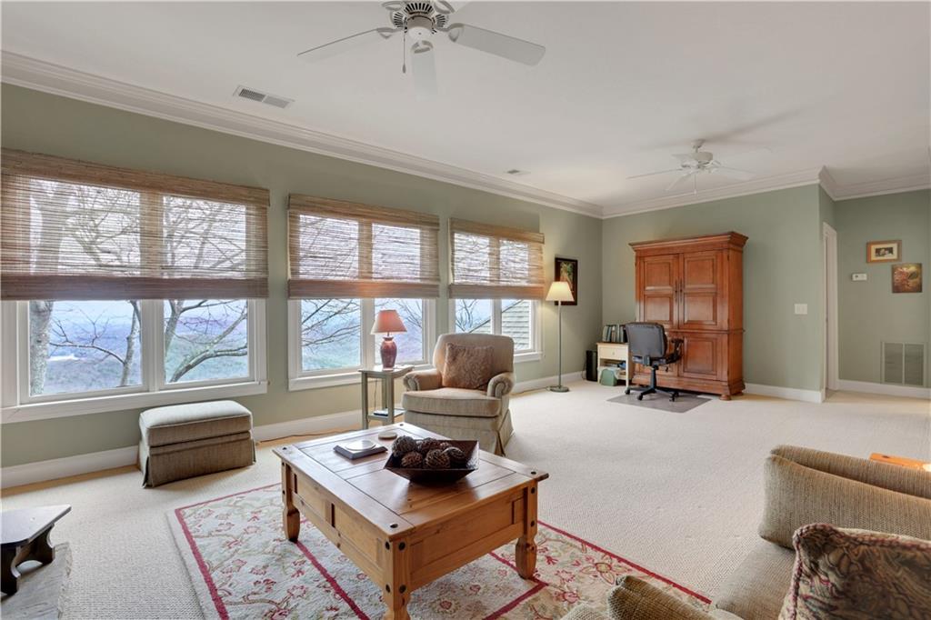 79 Strawberry Way Jasper, GA 30143 - Photo 36 of 67 a living room with furniture and a window