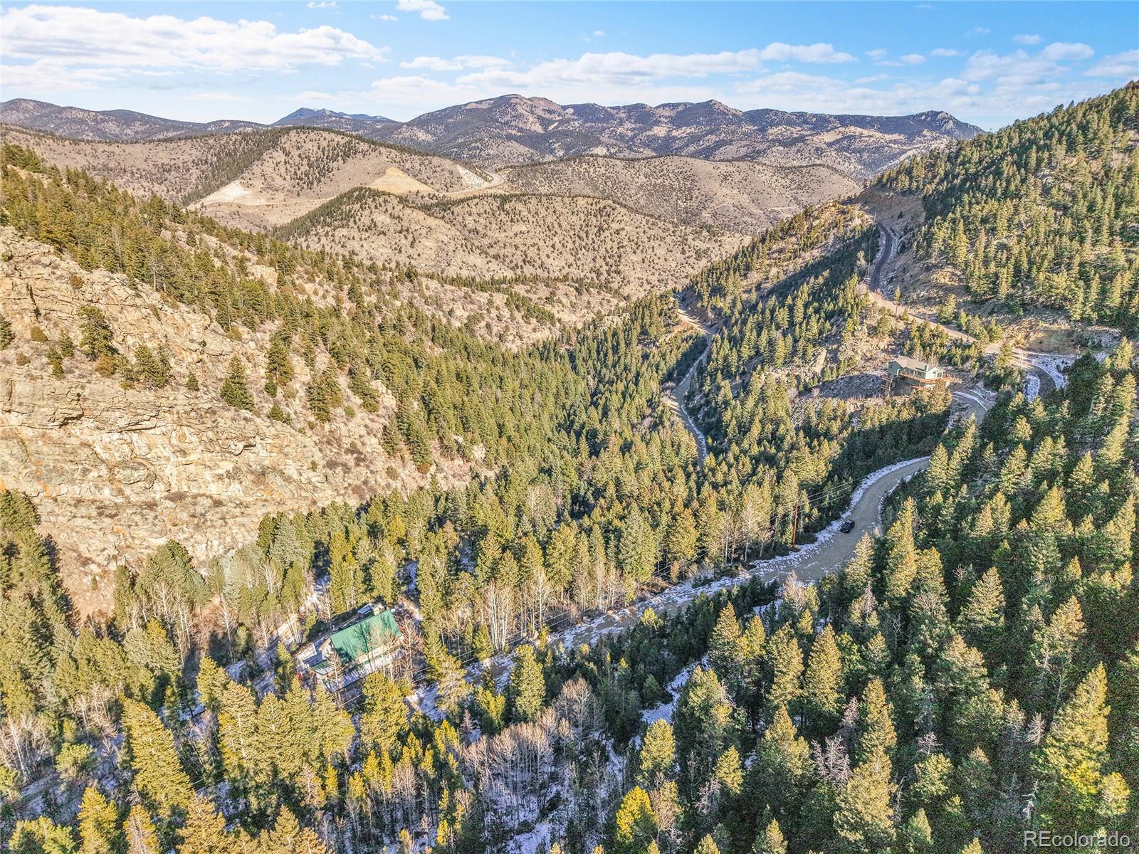 Clear Creek Rd Road Evergreen, CO 80439 - Photo 24 of 33 an aerial view of mountain with an ocean
