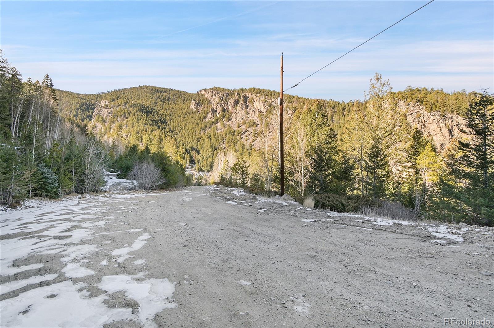 Clear Creek Rd Road Evergreen, CO 80439 - Photo 3 of 33 a view of a road with a yard