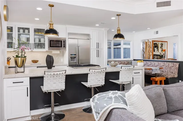 a living room with furniture fireplace and flat screen tv