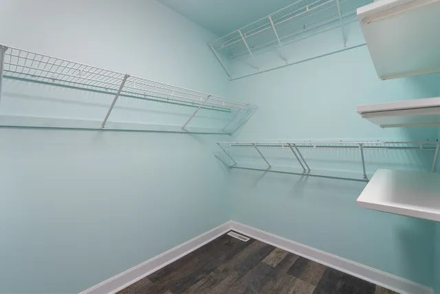 a view of a room with racks on the wall