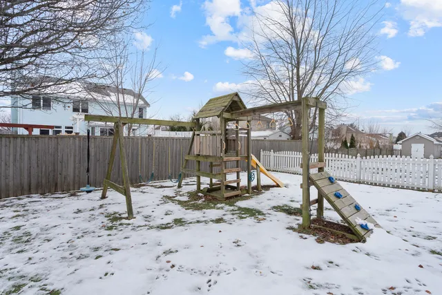 a view of parking space and snow