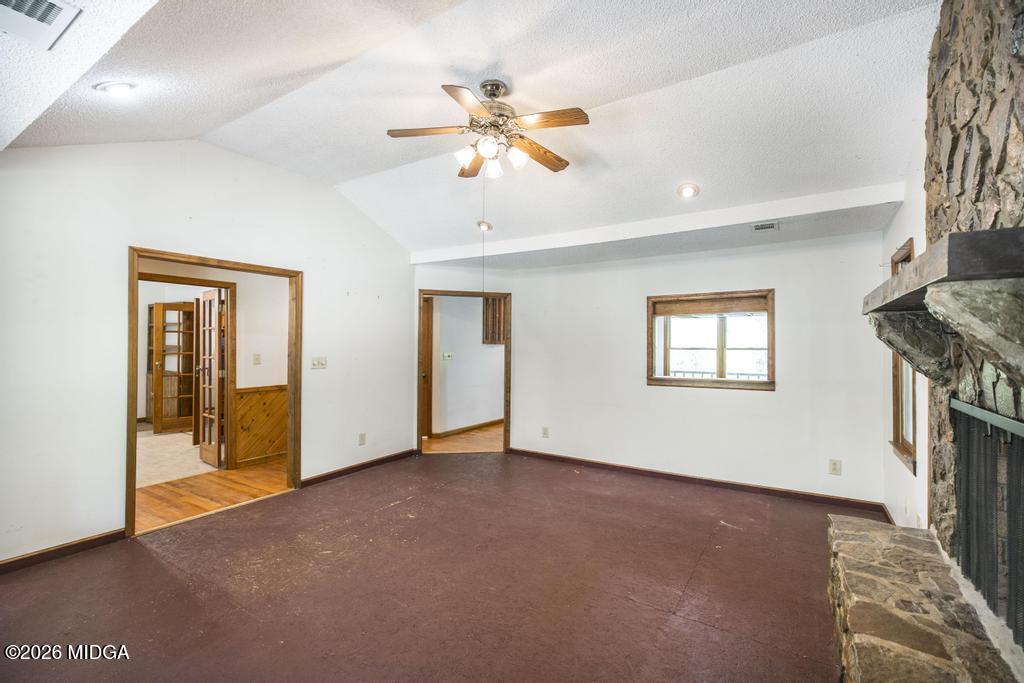 194 Delone Road Byron, GA 31008 - Photo 11 of 49 wooden floor in an empty room with a window