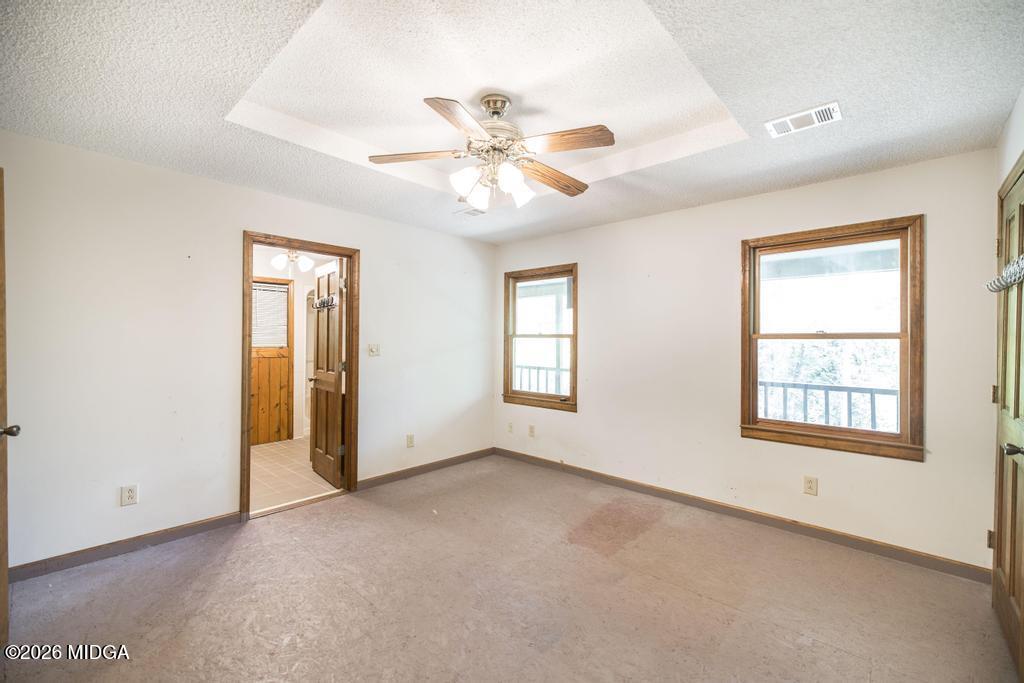 194 Delone Road Byron, GA 31008 - Photo 19 of 49 a view of an empty room with a window