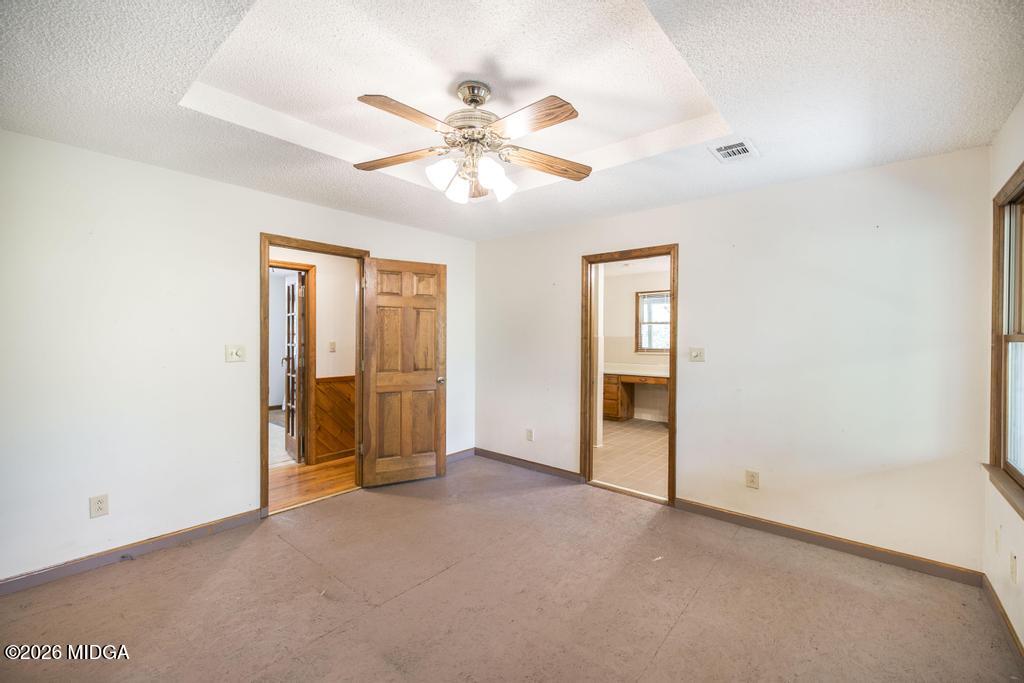 194 Delone Road Byron, GA 31008 - Photo 20 of 49 a view of an empty room with chandelier fan