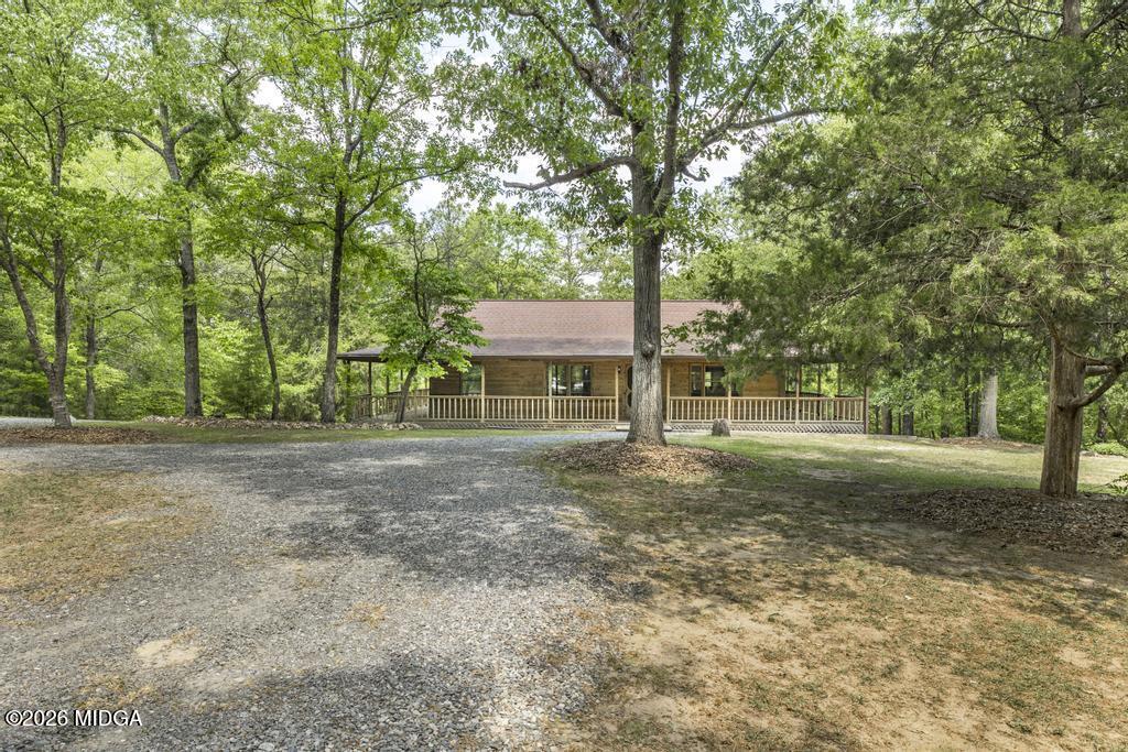 194 Delone Road Byron, GA 31008 - Photo 2 of 49 a view of a house with yard and a tree