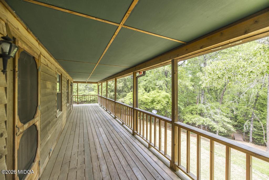 194 Delone Road Byron, GA 31008 - Photo 31 of 49 a view of a balcony with wooden floor