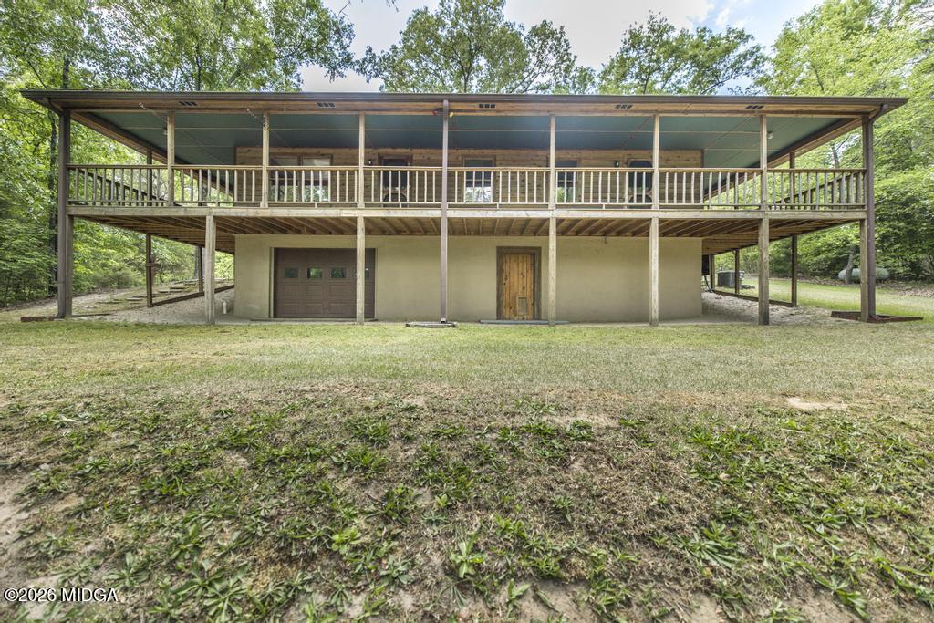 194 Delone Road Byron, GA 31008 - Photo 34 of 49 a view of a house with a yard and a large window
