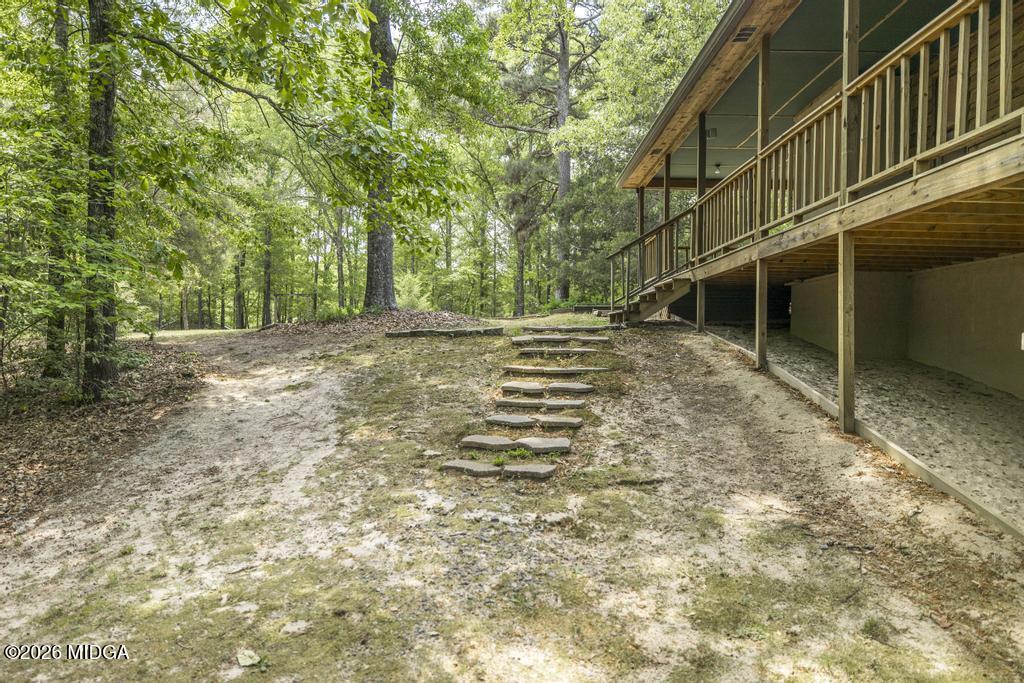194 Delone Road Byron, GA 31008 - Photo 38 of 49 a view of a yard with wooden fence
