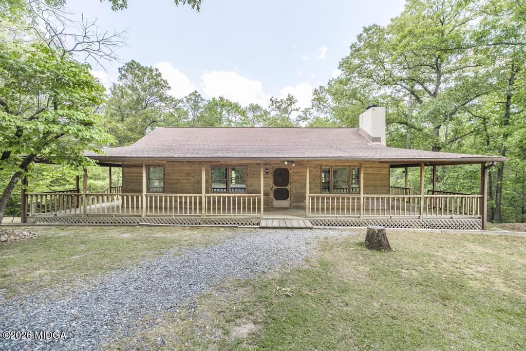 194 Delone Road Byron, GA 31008 - Photo 5 of 49 a front view of a house with a garden