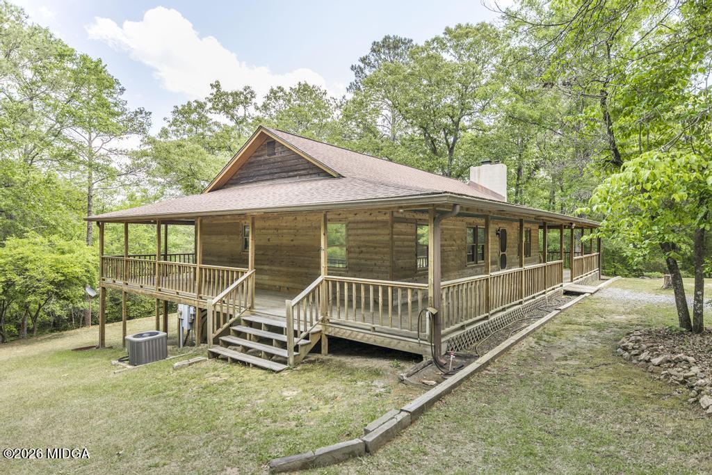 194 Delone Road Byron, GA 31008 - Photo 6 of 49 a view of a house with backyard and sitting area