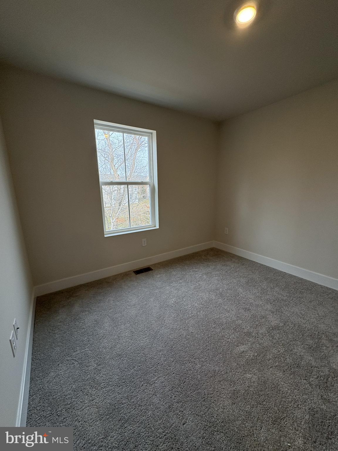 7448 Cornerstone Way Laurel, MD 20707 - Photo 12 of 13 an empty room with a window