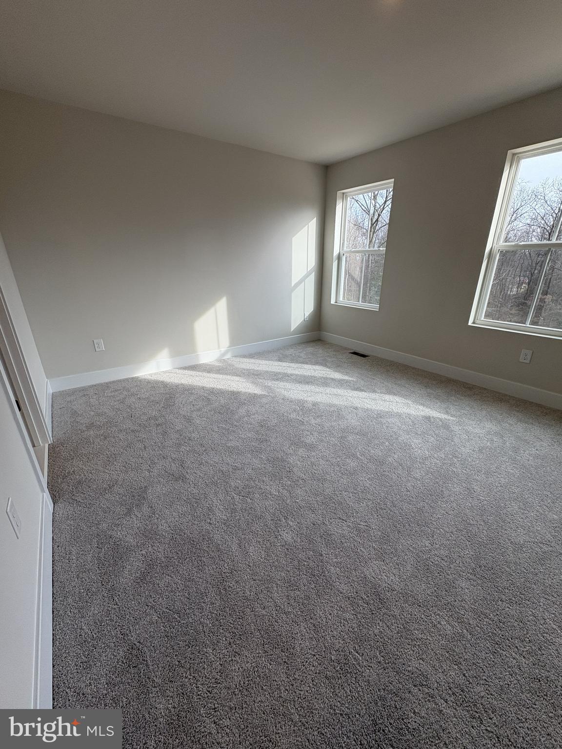 7448 Cornerstone Way Laurel, MD 20707 - Photo 7 of 13 a view of an empty room and window