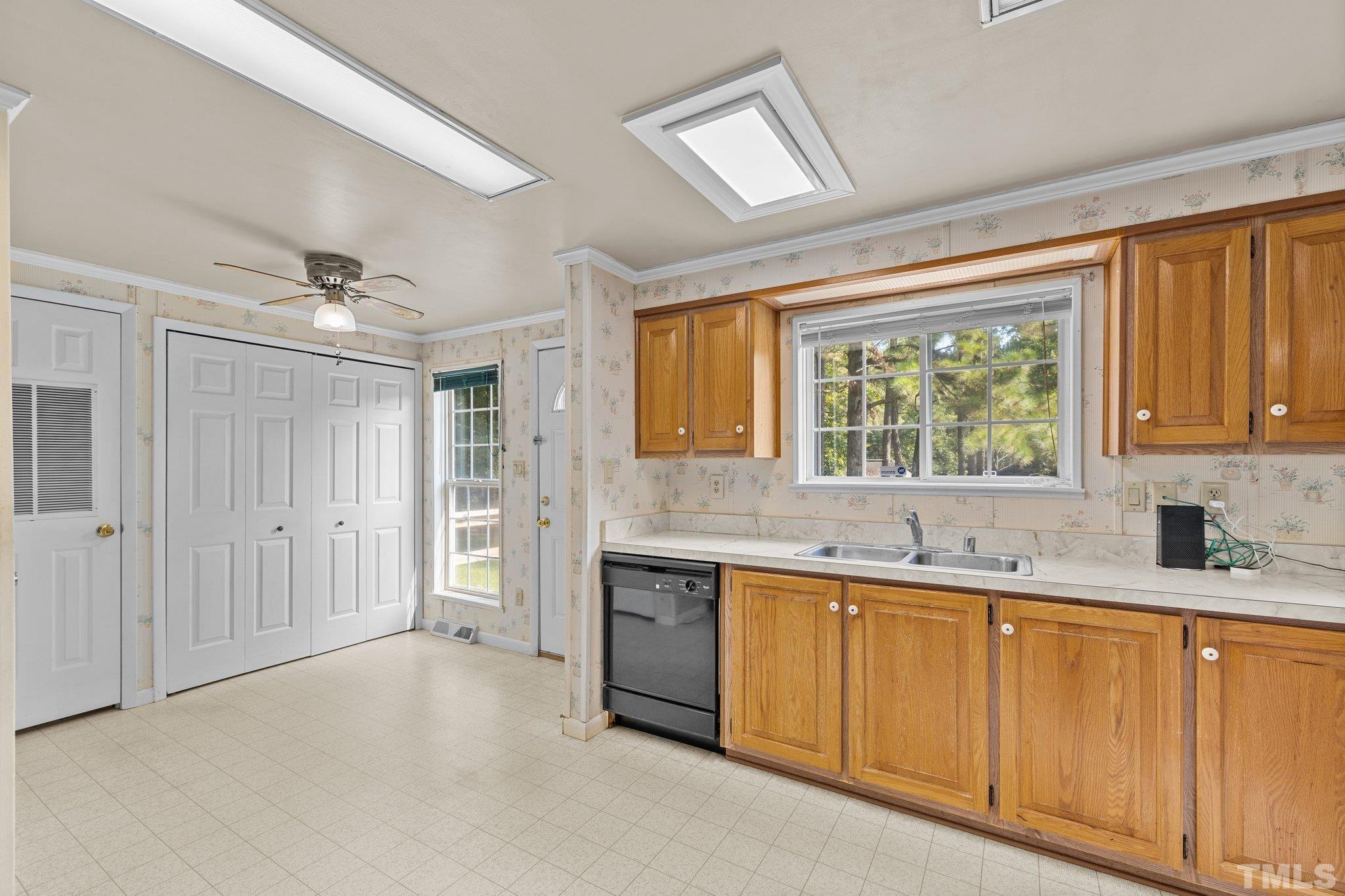4505 Guess Road Rougemont, NC 27572 - Photo 14 of 33 a kitchen with a sink stove and cabinets