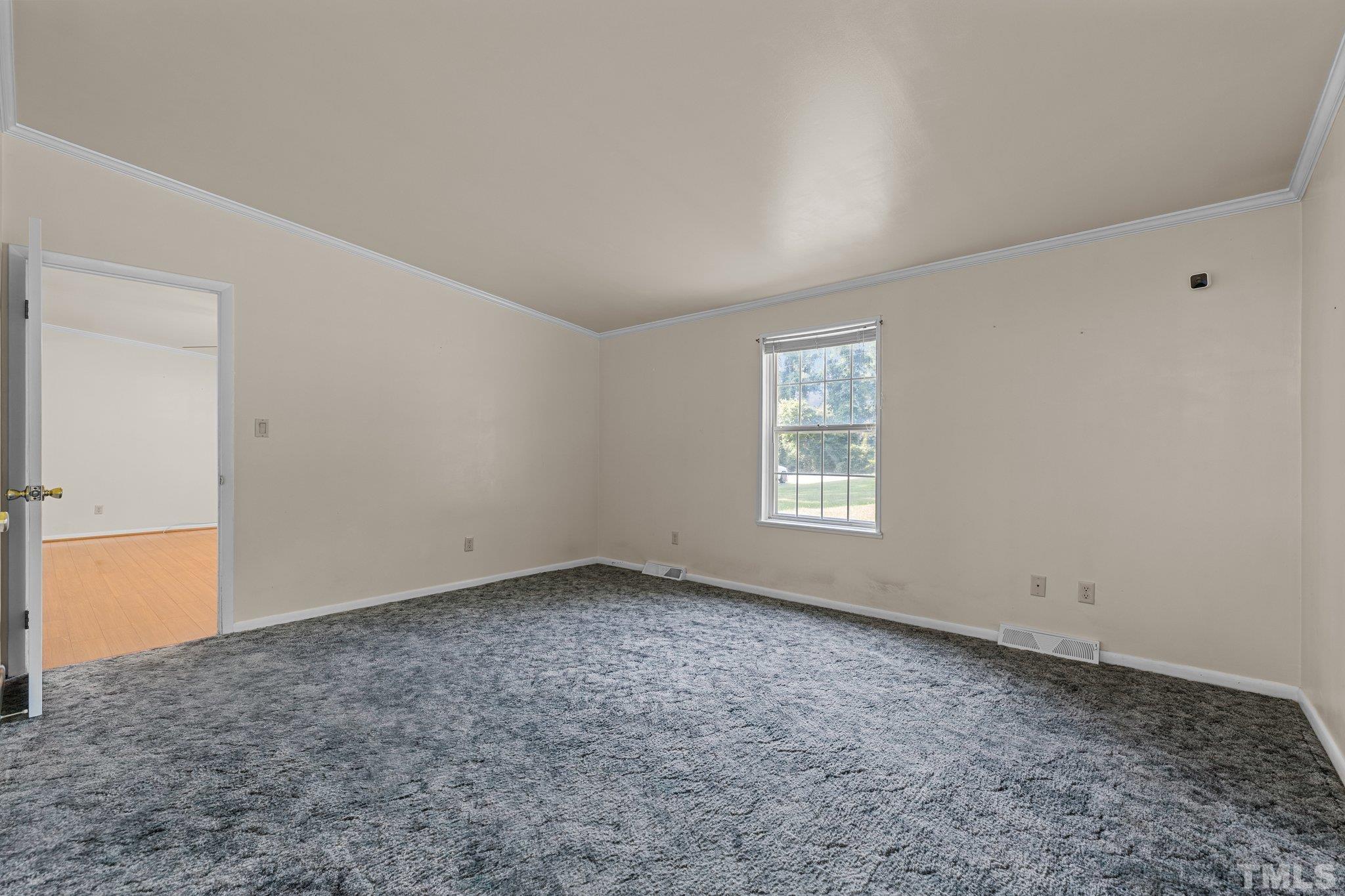 4505 Guess Road Rougemont, NC 27572 - Photo 18 of 33 an empty room with a window