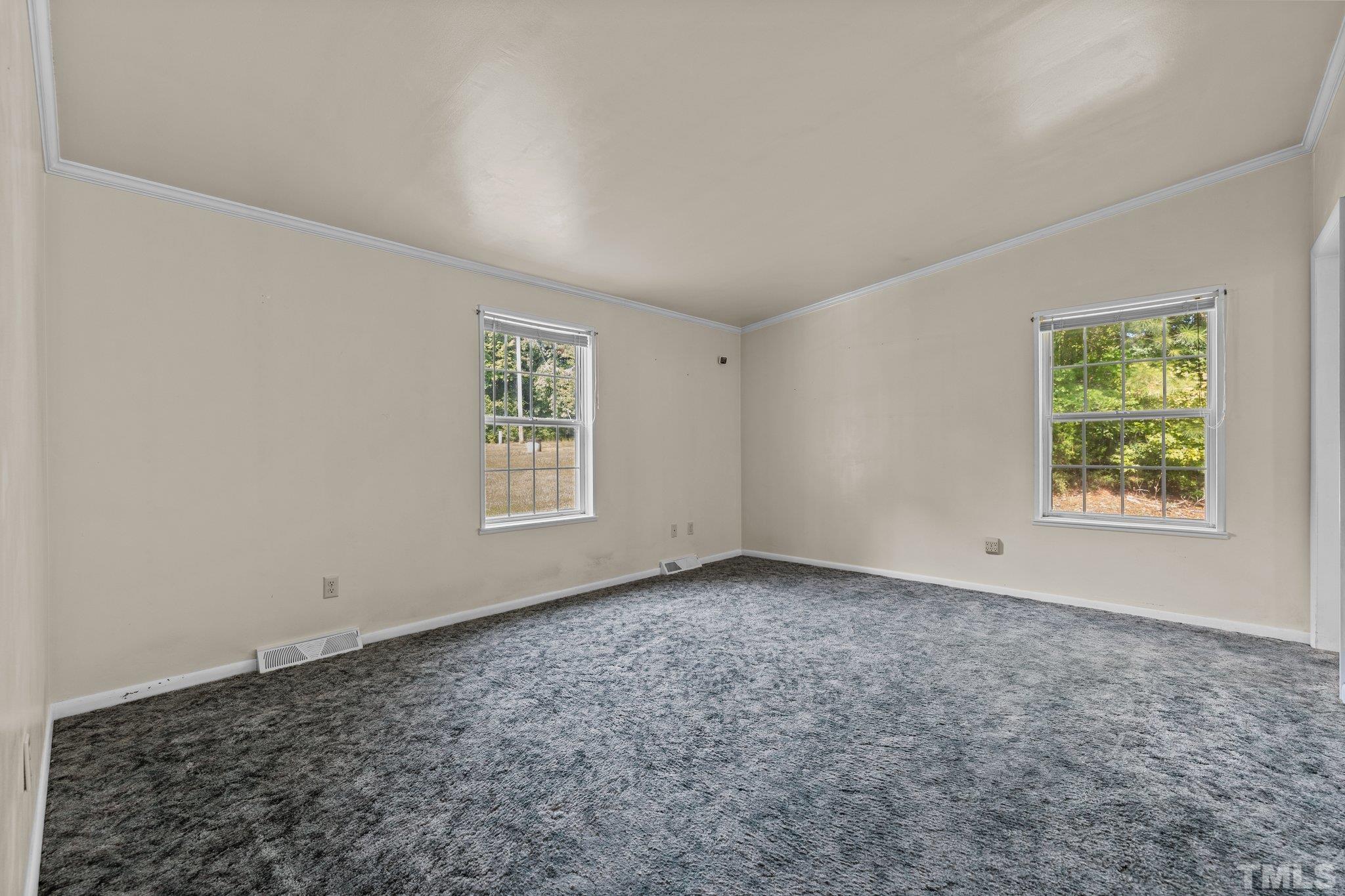 4505 Guess Road Rougemont, NC 27572 - Photo 19 of 33 an empty room with windows