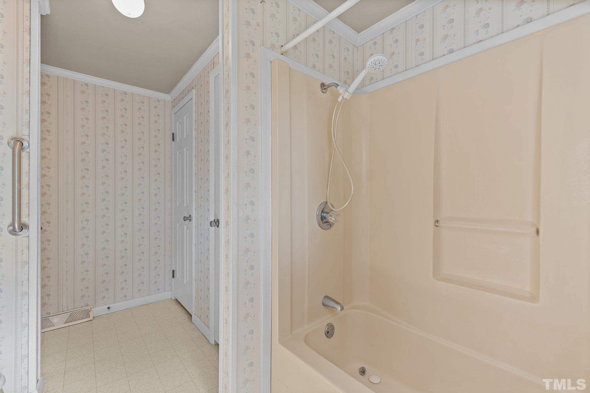 4505 Guess Road Rougemont, NC 27572 - Photo 23 of 33 a bathroom with a bathtub